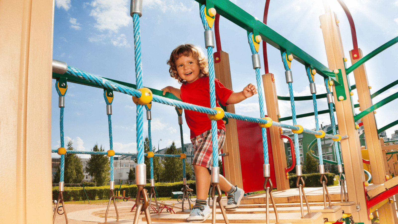 Family Travel Made Easy: Top Tips for Traveling With Kids 2 Kid Playing in Playground