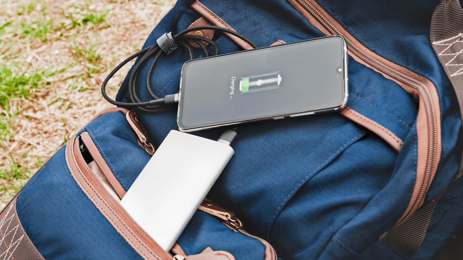 Uncover 11 Must-Have Summer Travel Accessories 2 Power bank charging phone