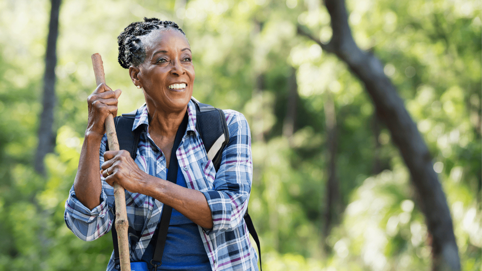 Hiking Past 60: 11 Tips to Keep You on the Trail 9 Woman Smiling While Hiking