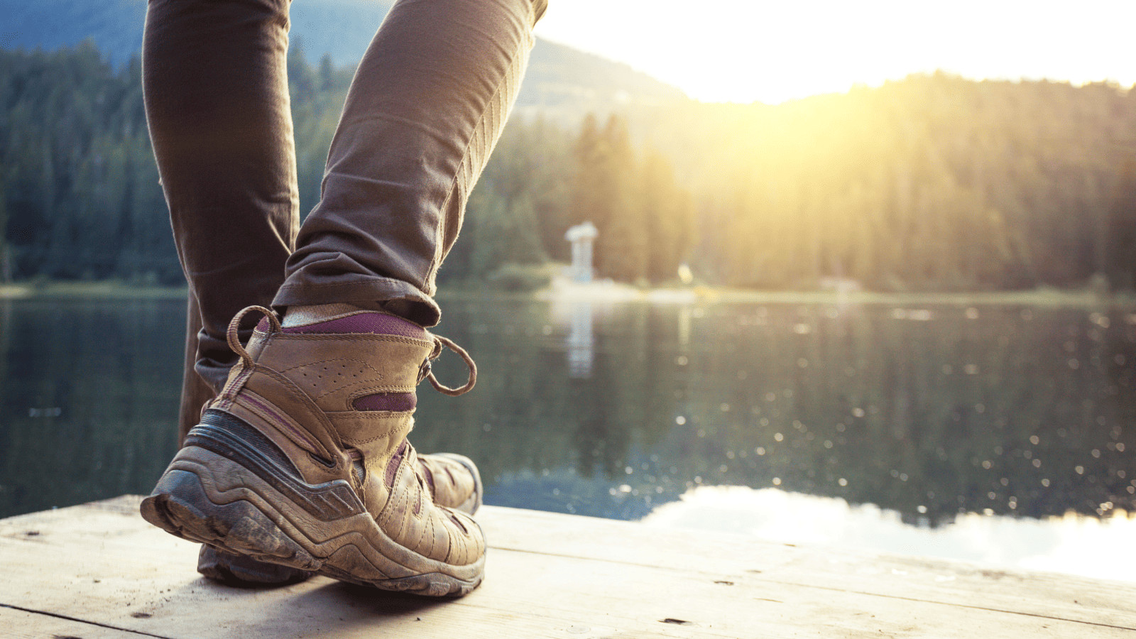 Hiking shoes by a lake