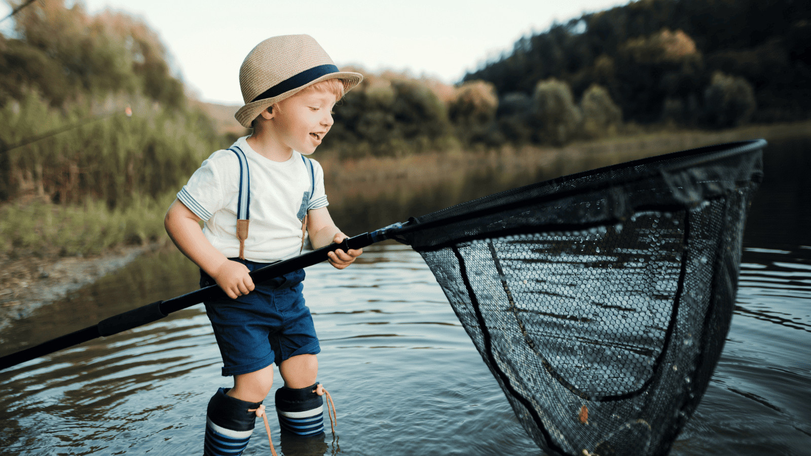 Lakes in North Dakota: Exploring 12 of the State's Best Kept Secrets 4 Child with a fishing net in a lake
