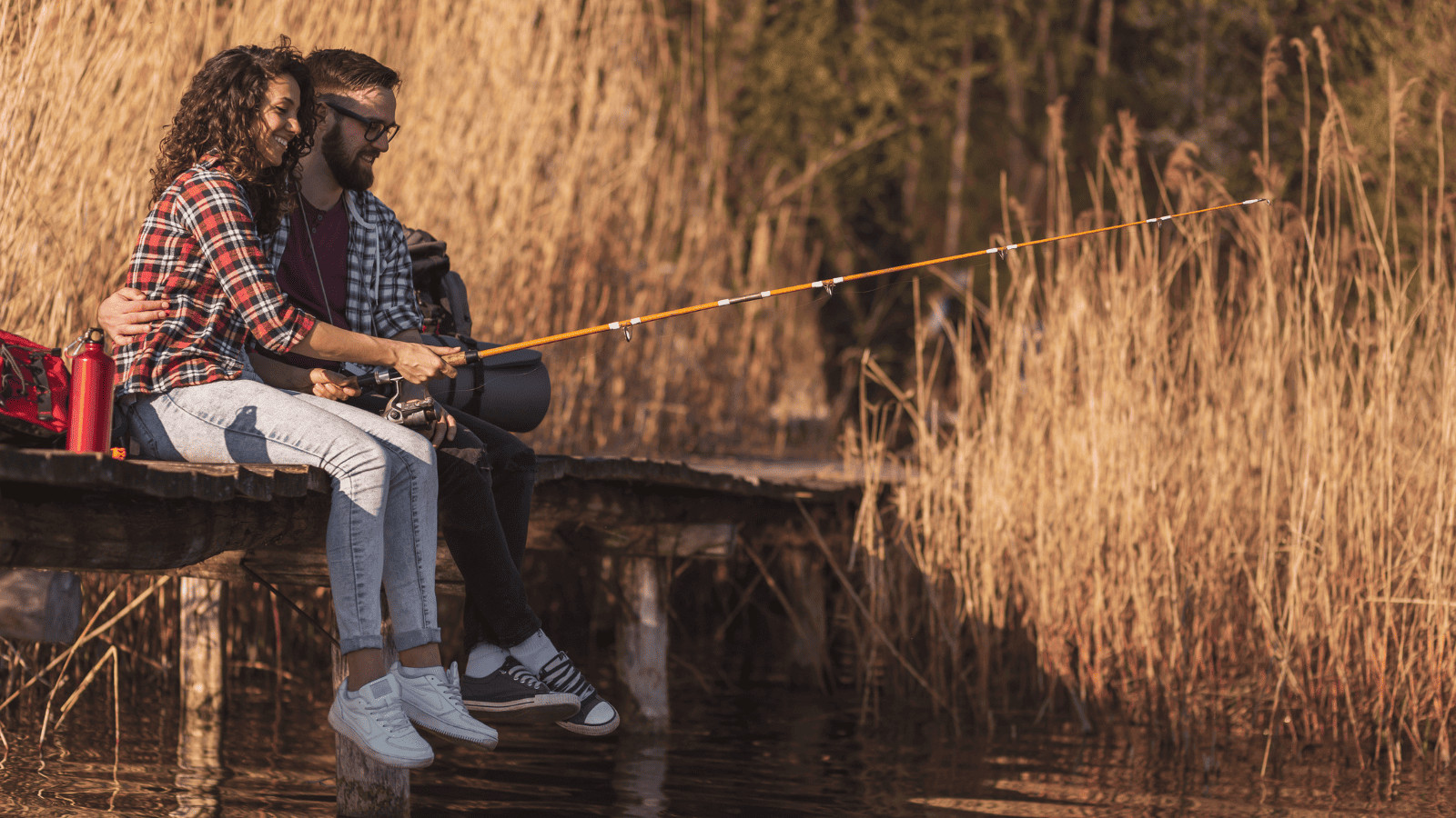 Man and woman fishing