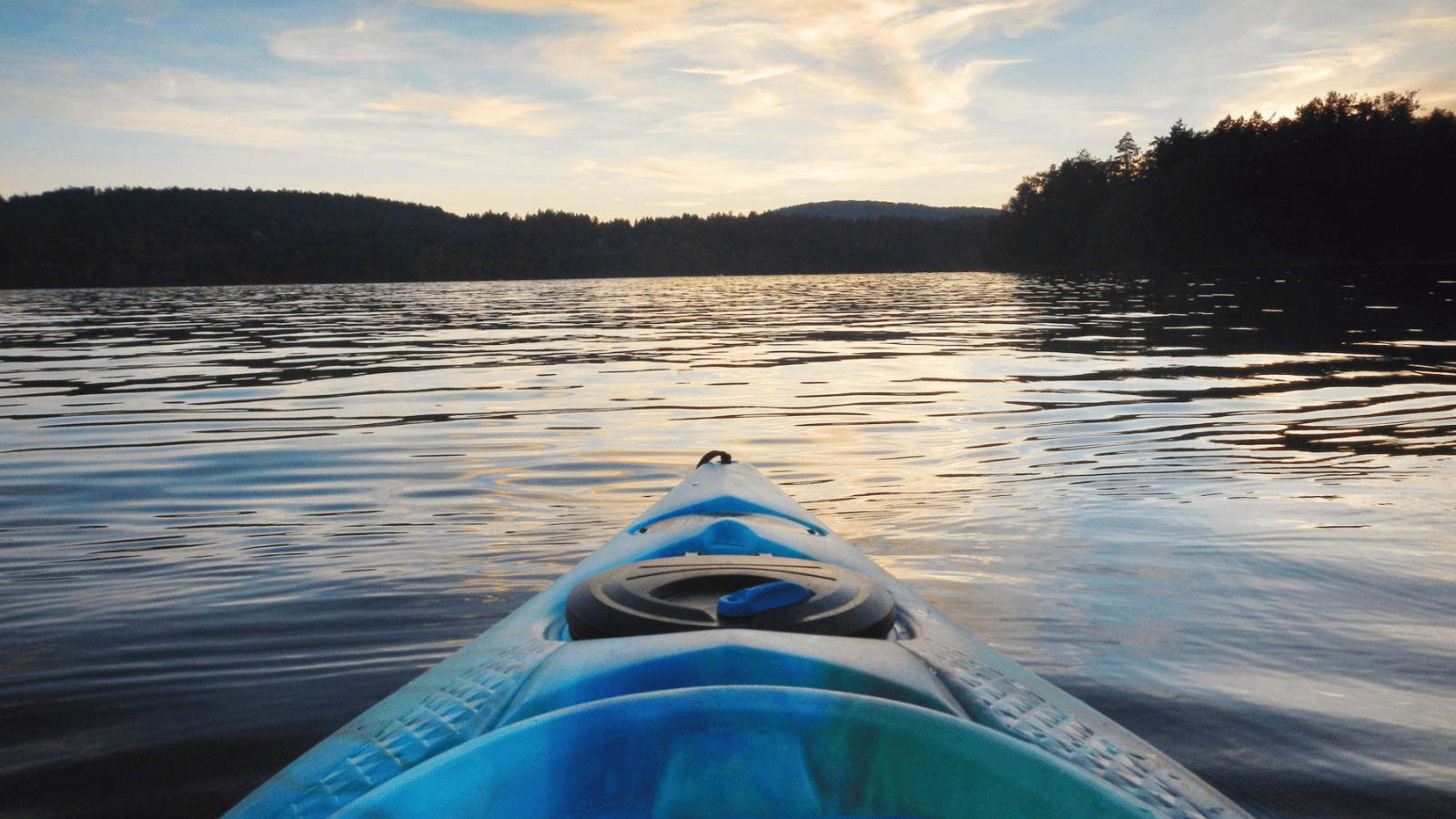 Dive into the Granite State: 14 Perfect Lakes in New Hampshire 14 Kayak on lake