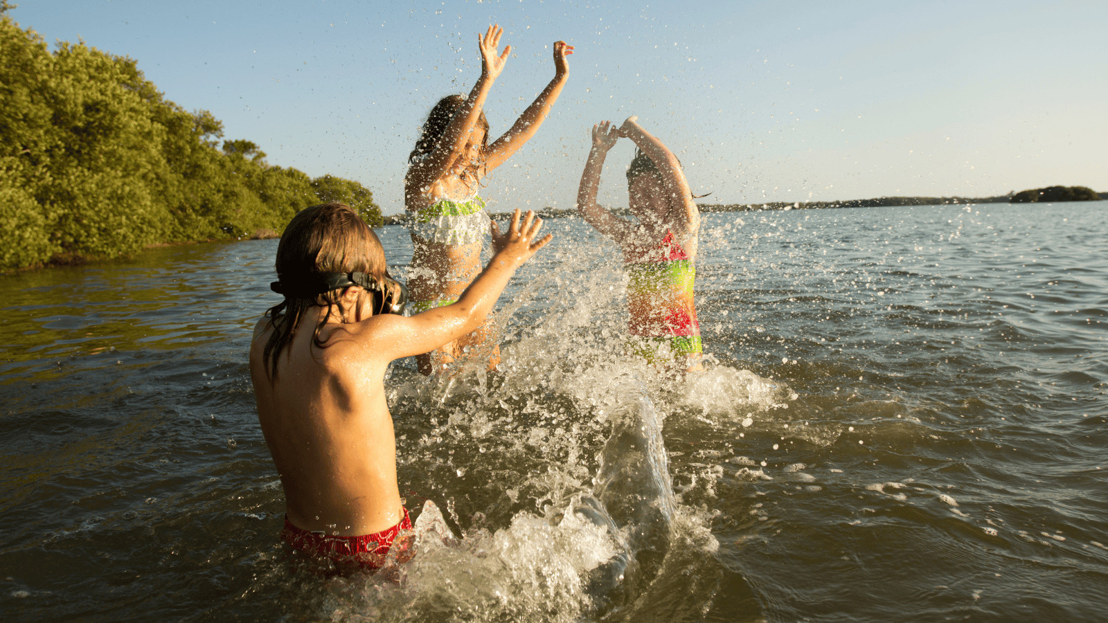 Kids playing in a lake