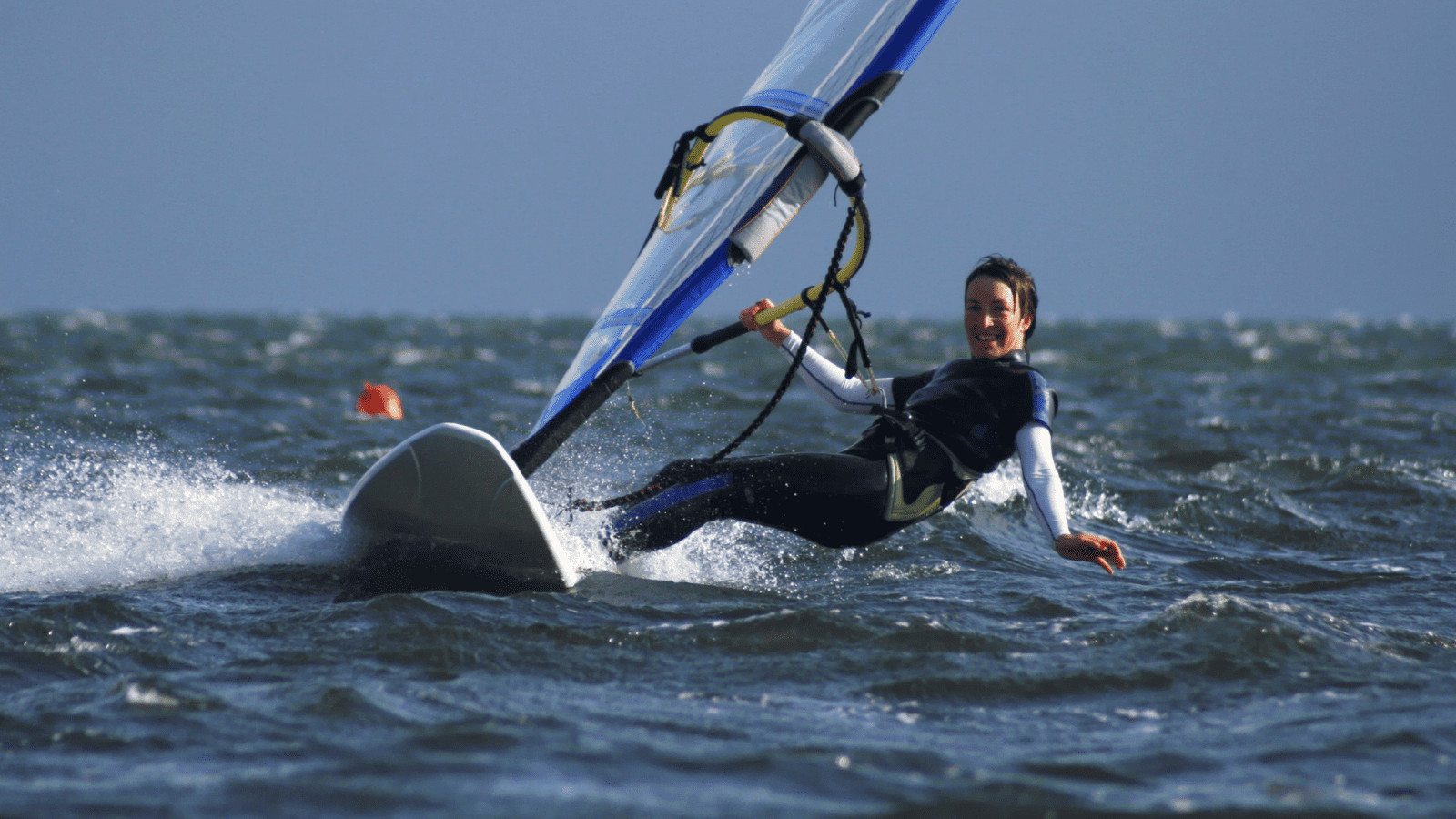 Women windsurfing