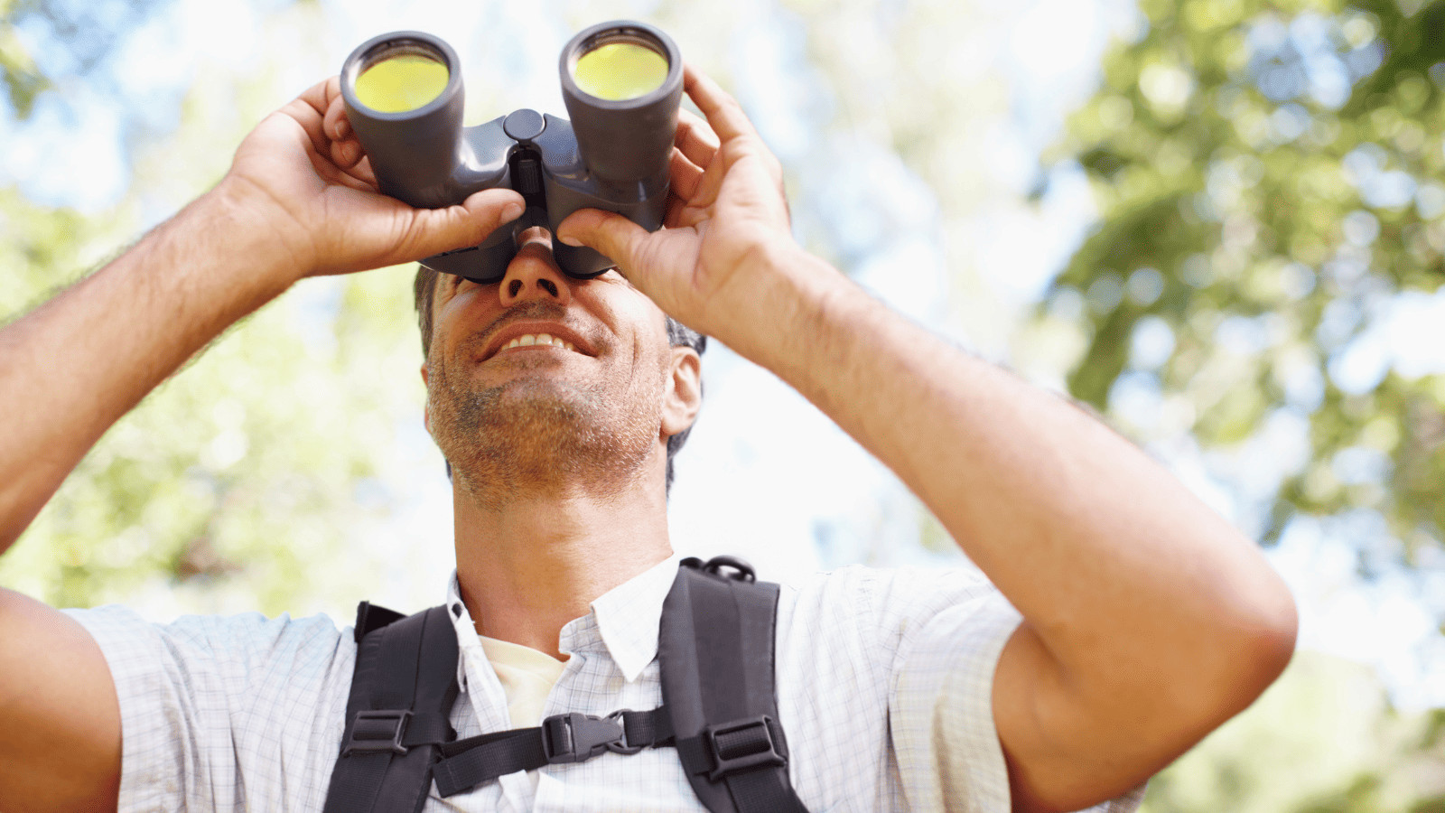 Man with binoculars