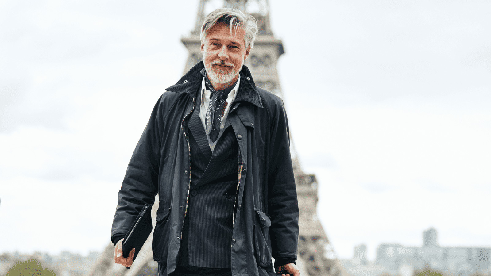 10 Secret Strategies to Love Your Long Layover 8 Man in Front of Eiffel Tower