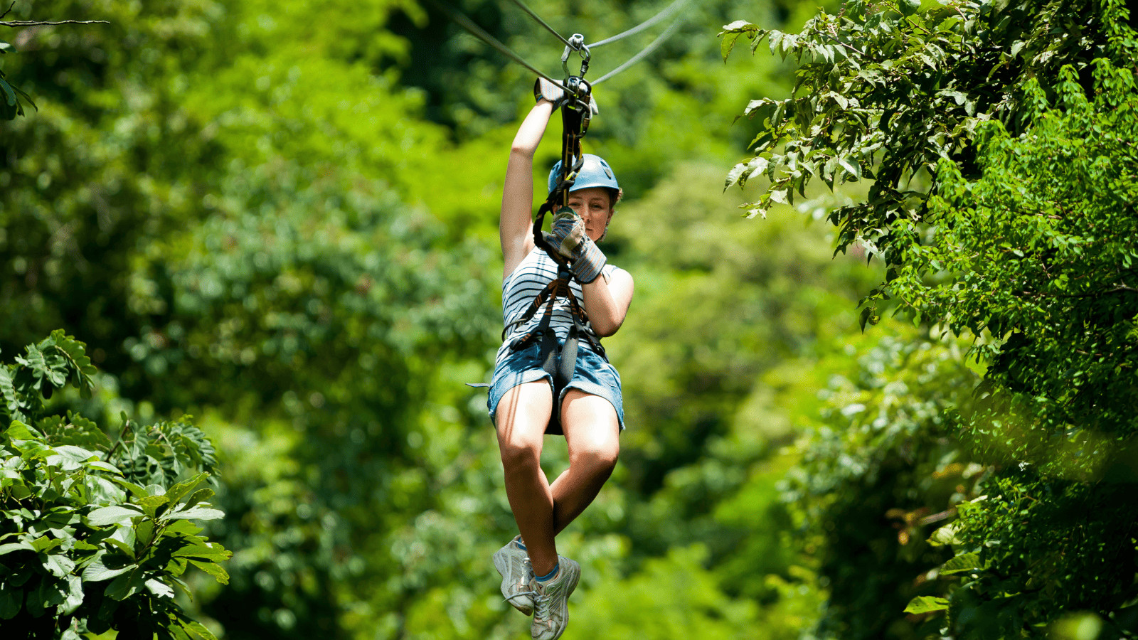 Woman ziplining
