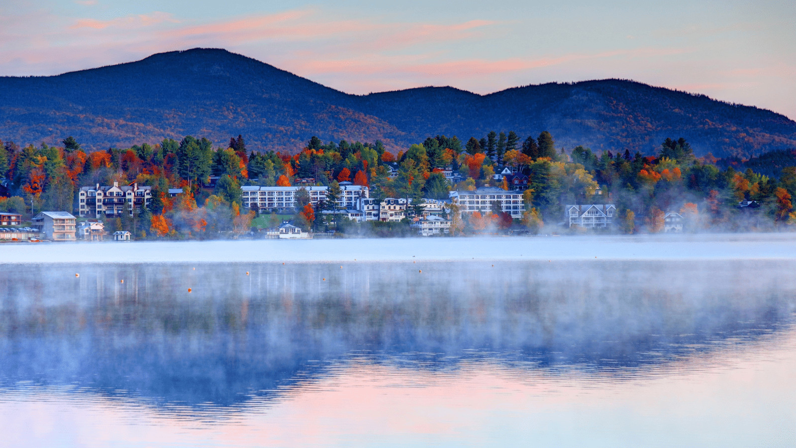 Unveiling the Top 11 US Cities for Fall Foliage 4 Lake Placid New York Canva