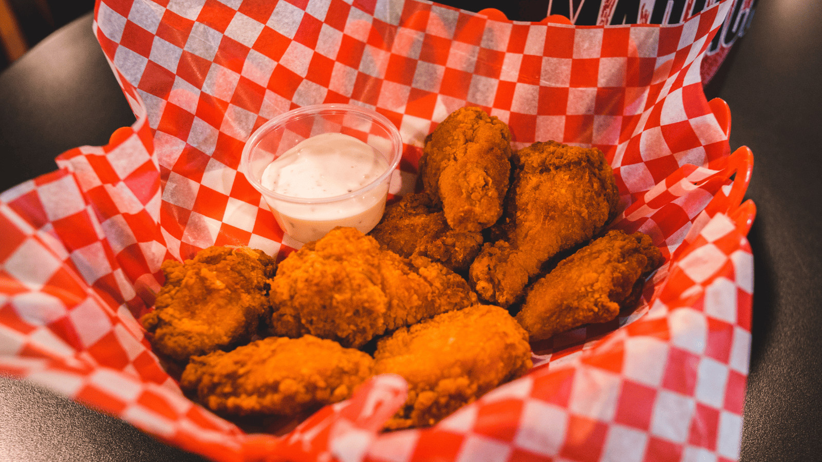 Cowboy State Cuisine: The 10 Wyoming Eateries that Caught Guy Fieri's Eye! 4 Wings and sauce