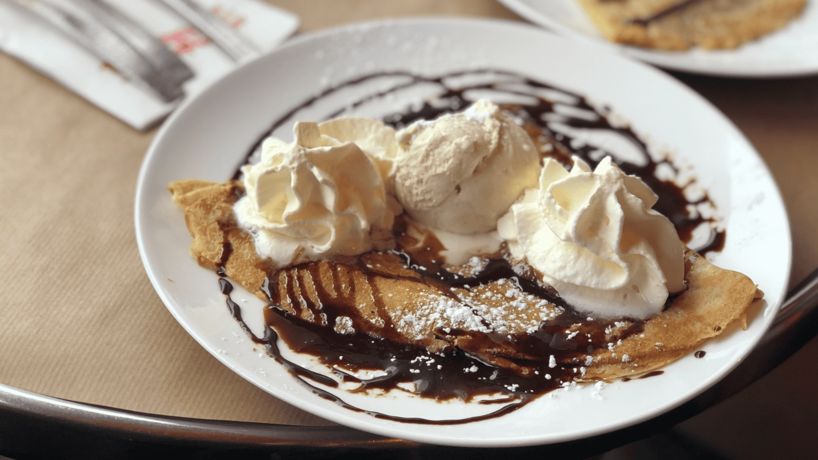 Crepes with ice cream and chocolate sauce