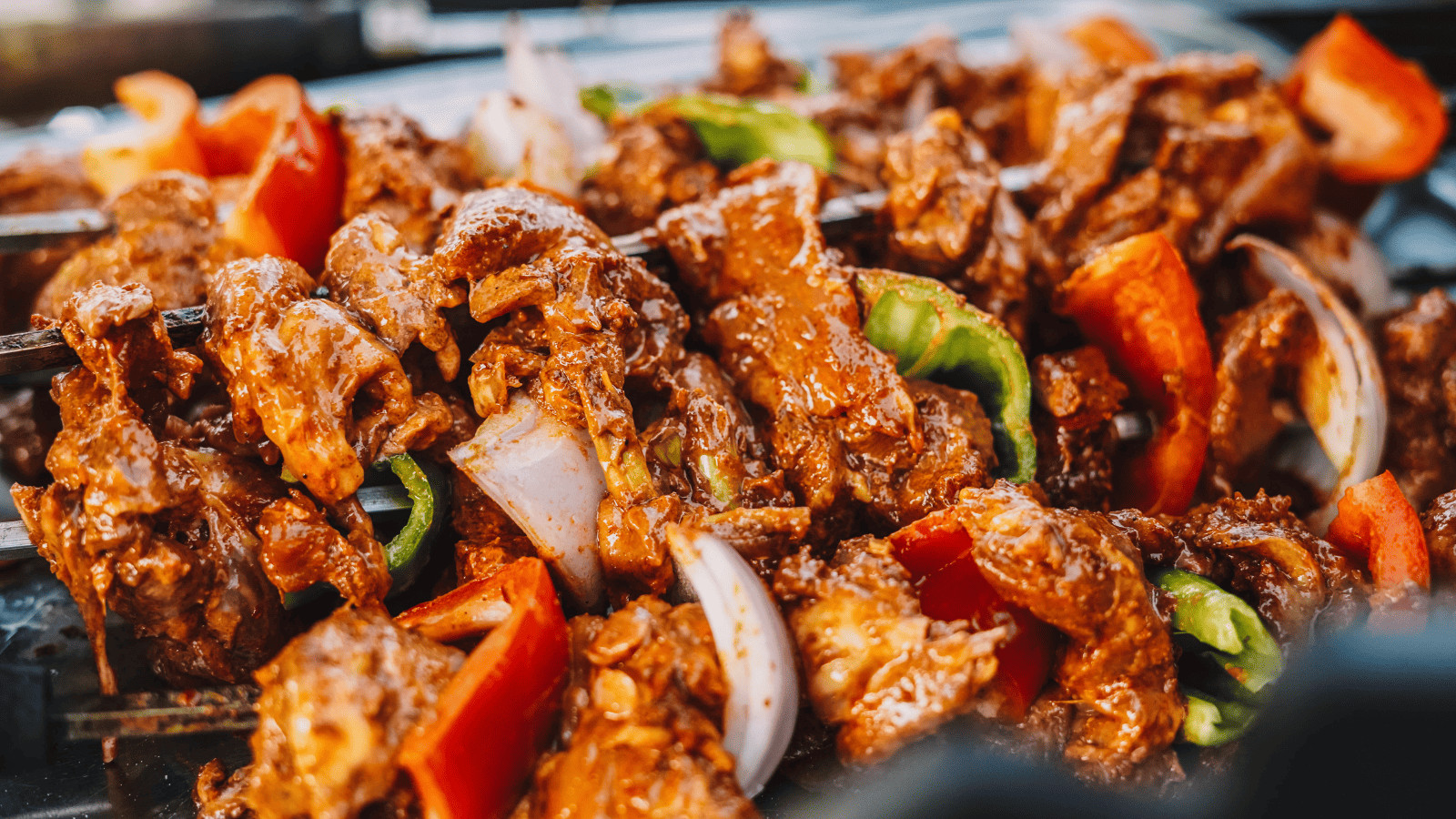Guy Fieri's Michigan Food Tour: 10 Must-Visit Diners, Drive-Ins, and Dives! 8 BBQ skewers
