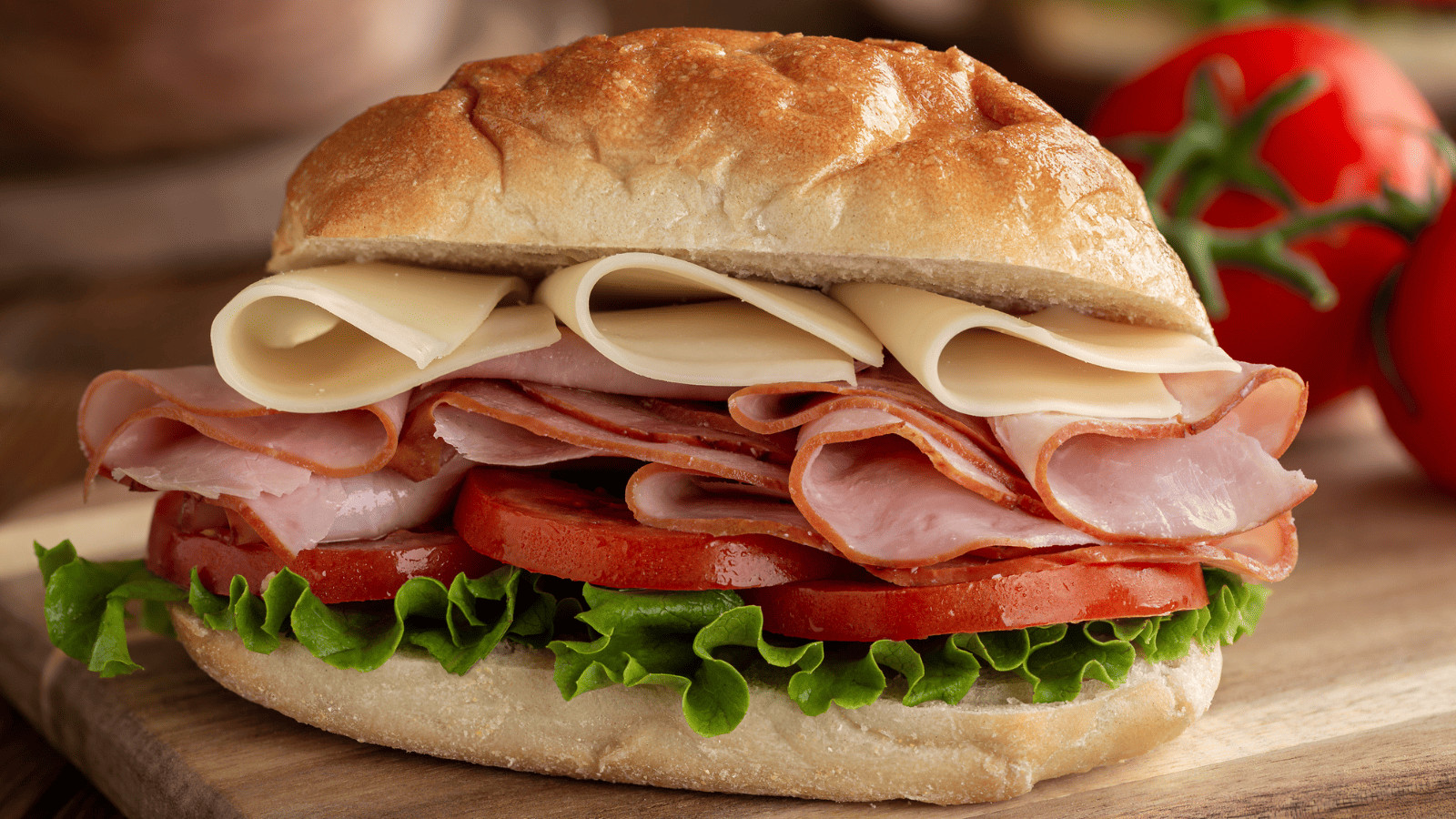 Hit the Jackpot with Guy Fieri: Nevada's 15 Winning Diners, Drive-Ins, and Dives! 7 A deli sandwich with meat, cheese, tomatoes, and lettuce