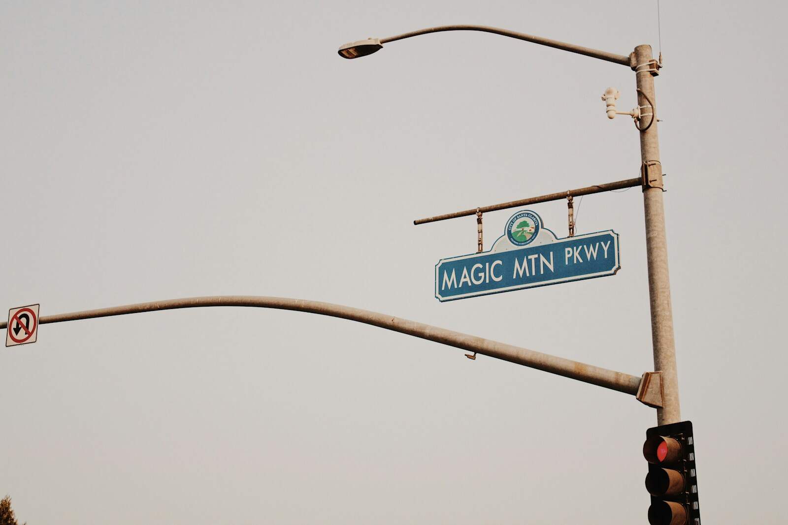 TripAdvisor's Theme Park Rankings Are So Bad They're Actually Hilarious 1 white and green street sign