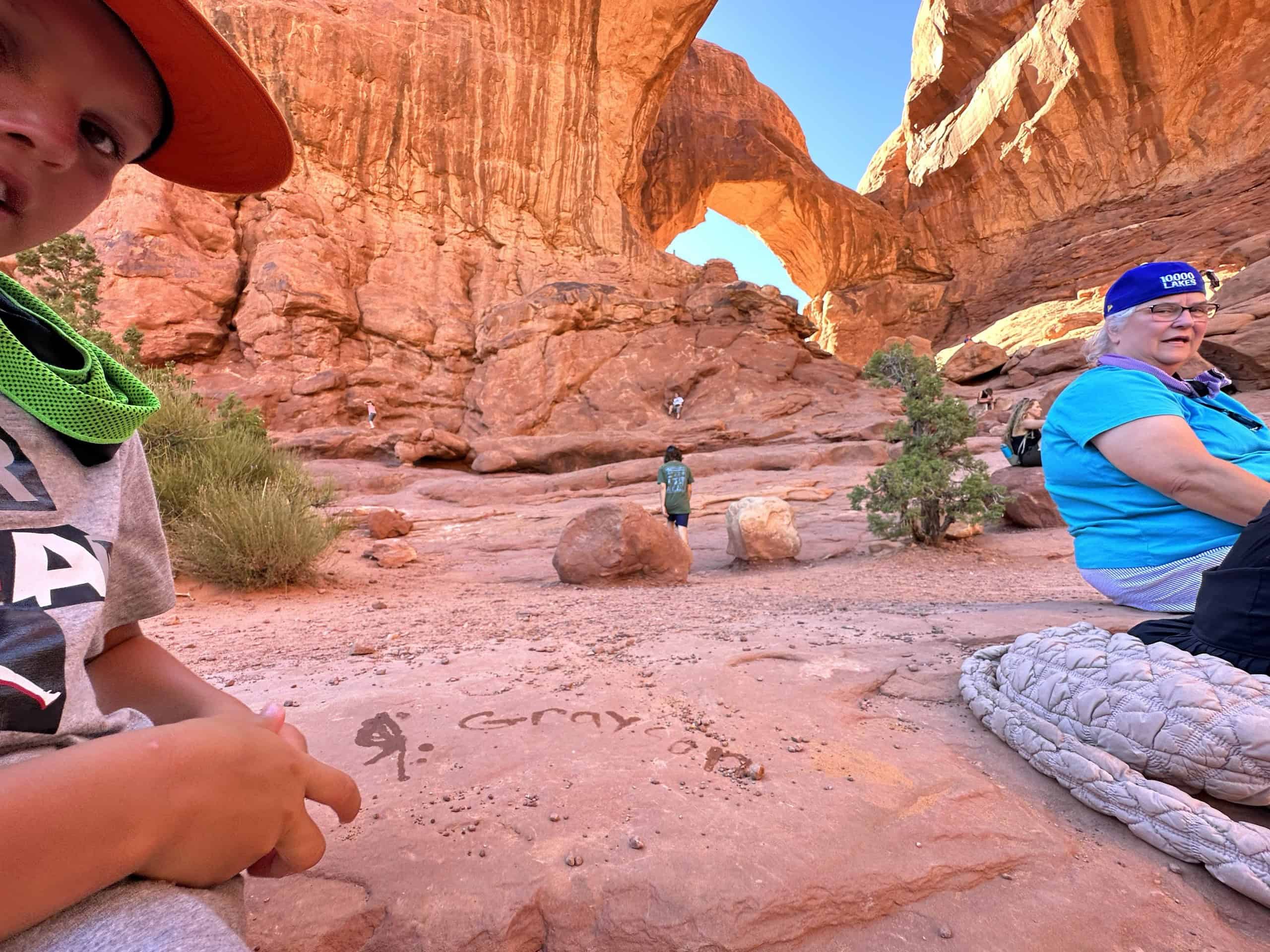 We’ve Been to Arches Five Times — Here’s Why We Never Get Tired of It 8 One of our sons exploring the rocks at Arches in 2024