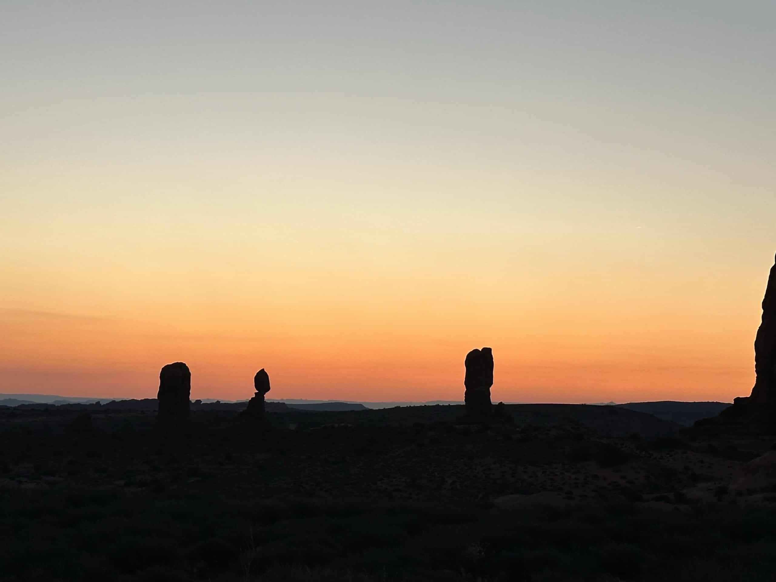 We’ve Been to Arches Five Times — Here’s Why We Never Get Tired of It 2 Dusk over the rock formations in Arches National Park