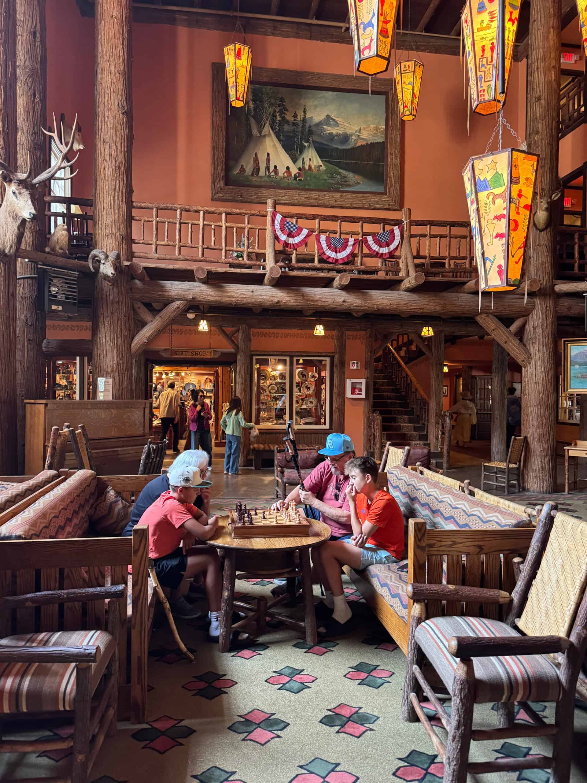 A group gathered inside a timber lodge